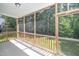 Light and airy screened in porch, ready for outdoor living and entertaining at 4009 Patriot Ridge Ct, Raleigh, NC 27610