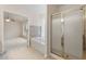 Bathroom features a glass door shower and separate soaking tub at 402 Halls Mill Dr, Cary, NC 27519