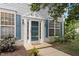 Charming front door entrance featuring decorative trim and sidelights at 402 Halls Mill Dr, Cary, NC 27519