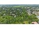 Expansive aerial view of a residential area with mature trees and well-maintained homes at 441 Fieldstone Dr, Burlington, NC 27215