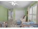 Comfortable bedroom with pale green walls, a large closet, and neutral furnishings at 441 Fieldstone Dr, Burlington, NC 27215