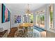 Charming dining room with stylish chandelier and access to outdoor patio at 441 Fieldstone Dr, Burlington, NC 27215