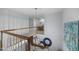 Upstairs hallway with a view of the staircase and decor at 441 Fieldstone Dr, Burlington, NC 27215