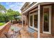 Relax on the brick patio with comfortable seating, perfect for outdoor enjoyment and access to the home's interior at 441 Fieldstone Dr, Burlington, NC 27215