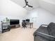 Attic bonus room perfect for gaming or movie nights, with a ceiling fan at 4502 Joe Cotton Dr, Knightdale, NC 27545