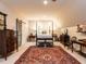 Spacious bedroom featuring four poster bed, rug, and plenty of storage at 4716 Shadow Ridge Ct, Holly Springs, NC 27540