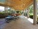 Spacious covered pavilion with picnic tables, concrete floors, and sturdy support columns at 4716 Shadow Ridge Ct, Holly Springs, NC 27540