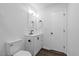 Tastefully updated bathroom features a toilet and floating vanity with black hardware at 5110 Old Well St, Durham, NC 27704
