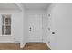 Bright entryway with light hardwood floors at 5110 Old Well St, Durham, NC 27704