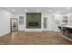 Modern kitchen with a large island, sleek countertops, and stainless steel appliances, perfect for cooking and entertaining at 5110 Old Well St, Durham, NC 27704