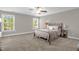 A serene bedroom featuring soft lighting and a comfortable queen-sized bed at 512 Barneswyck Dr, Fuquay Varina, NC 27526
