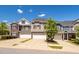 Attractive townhomes with varied architectural designs, complemented by lush green trees and well-kept lawns at 512 Barneswyck Dr, Fuquay Varina, NC 27526