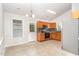 Kitchen showcasing wooden cabinets, modern appliances, and tiled backsplash for a functional cooking space at 606 Arden St, Burlington, NC 27215