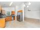 Kitchen featuring stainless steel appliances, wood cabinets, and an open layout for easy meal preparation at 606 Arden St, Burlington, NC 27215