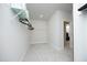 Spacious walk-in closet with carpeted floors, wire shelving, and a view to the entrance to an adjacent room at 609 Ramsours Mill Dr, Holly Springs, NC 27540
