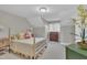 Bedroom with white walls, carpet flooring, and four poster bed at 7601 Wellesley N Park, Raleigh, NC 27615