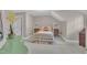 Charming bedroom with carpet flooring and floral bedding with view of front yard at 7601 Wellesley N Park, Raleigh, NC 27615