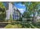 Beautiful house with a landscaped yard, large bay window, and a classic chimney at 7601 Wellesley N Park, Raleigh, NC 27615