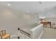 Hallway features neutral wall color, carpet flooring, and view of study at 7601 Wellesley N Park, Raleigh, NC 27615