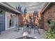 Relaxing patio with outdoor seating and easy access via sliding glass door at 7601 Wellesley N Park, Raleigh, NC 27615