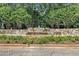 Attractive stone tiered water feature in landscaped common area at 7601 Wellesley N Park, Raleigh, NC 27615