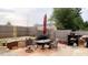 Backyard with patio furniture, shed, and wooden fence, ideal for outdoor gatherings at 764 Grove Creek Ln, Raleigh, NC 27610