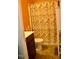 Cozy full bathroom with a vanity, toilet, and tub with patterned shower curtain at 764 Grove Creek Ln, Raleigh, NC 27610