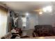 Bright living area with ample seating and a view of the front entrance at 764 Grove Creek Ln, Raleigh, NC 27610