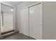 Hallway featuring neutral paint, new floors and access to bedrooms and living area at 780 Indian Trail Village, Burlington, NC 27217