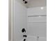 Modern shower with black fixtures and white subway tile surround at 780 Indian Trail Village, Burlington, NC 27217