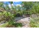 Private backyard with basketball court and lush greenery, perfect for outdoor activities and relaxation at 821 Onslow St, Durham, NC 27705