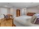 Spacious bedroom offering a bed, desk, dresser, hardwood flooring, and natural light at 821 Onslow St, Durham, NC 27705