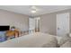 Inviting bedroom with hardwood floors, a ceiling fan, and ample natural light at 821 Onslow St, Durham, NC 27705