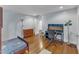 Comfortable bedroom with desk, hardwood floors, neutral walls, and ample natural light at 821 Onslow St, Durham, NC 27705