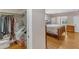 Spacious bedroom with hardwood floors, a walk-in closet, and lots of natural light at 821 Onslow St, Durham, NC 27705