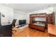 Spacious bedroom with hardwood floors, bunk bed, dresser, and desk at 821 Onslow St, Durham, NC 27705