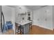 Charming dining area with a marble countertop bar and stylish seating for casual meals and entertaining at 821 Onslow St, Durham, NC 27705