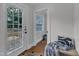 Welcoming entryway with a glass paneled door to deck, offering bright natural light and views at 821 Onslow St, Durham, NC 27705