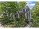 Charming home with mature landscaping and a prominent chimney at 821 Onslow St, Durham, NC 27705