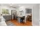 Bright kitchen with stainless steel appliances, a marble countertop, and eat-in breakfast bar at 821 Onslow St, Durham, NC 27705