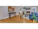 Cozy living room featuring a fireplace, hardwood floors, and elegant decor at 821 Onslow St, Durham, NC 27705