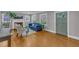 Cozy living room with fireplace, hardwood flooring, and ample natural light at 821 Onslow St, Durham, NC 27705