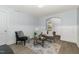 The living room features neutral paint colors, comfortable seating, and an arched doorway at 821 Onslow St, Durham, NC 27705