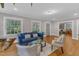 Inviting living room filled with natural light, hardwood floors, and comfortable seating at 821 Onslow St, Durham, NC 27705
