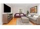 Cozy living room features hardwood floors, neutral decor, and ample seating at 821 Onslow St, Durham, NC 27705