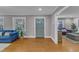 Open living room area with hardwood floors and neutral paint at 821 Onslow St, Durham, NC 27705