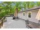 Expansive back deck featuring a fireplace and outdoor seating, perfect for entertaining guests at 8620 Glendale Dr, Apex, NC 27539