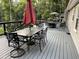 Spacious outdoor deck with ample dining furniture and seating, perfect for entertaining at 8620 Glendale Dr, Apex, NC 27539