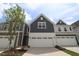 Charming home with a large garage and a well-manicured lawn and beautiful curb appeal at 914 Montague Ave, Durham, NC 27703
