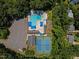 Overhead shot of the community pool and tennis courts, highlighting the recreational amenities at 924 Pebblebrook Dr, Raleigh, NC 27609